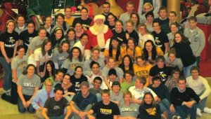 Occasionally swimming had nothing to do with water- it meant team photos with Santa on surprising December afternoons. 